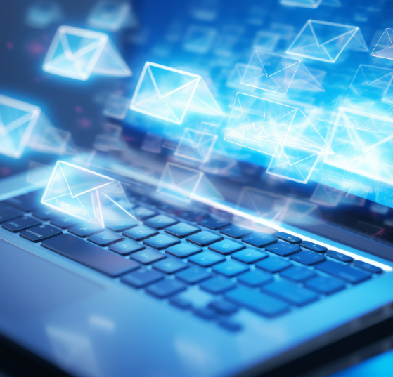 An illustration of a laptop with a blue mail hologram, symbolizing JTF Marketing’s expertise in lead scoring models.